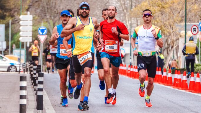 men running marathon approaching finish